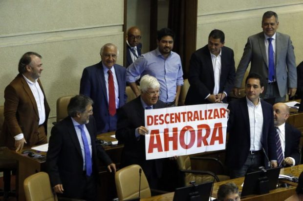 Fue en el 2 de febrero de 2018, a casi un mes del término del segundo mandato de Michelle Bachelet y casi un año después de que ingresaron al Congreso, que se promulgaron las dos leyes que regulan este proceso. Foto: ATON.