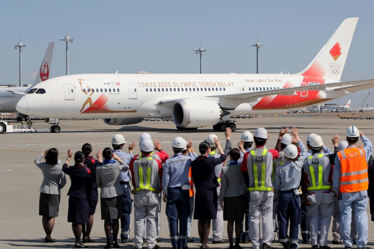 Un avión parte del aeropuerto Haneda de Tokio el 18 de marzo de 2020 rumbo a Grecia para recoger la llama olímpica.